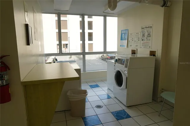 a bathroom with a sink mirror vanity and toilet