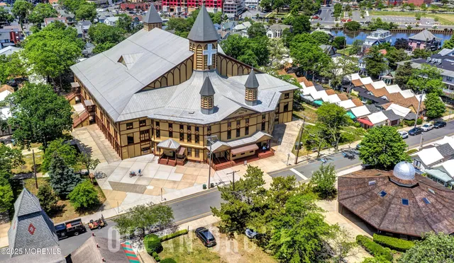 a view of a swimming pool with seating area