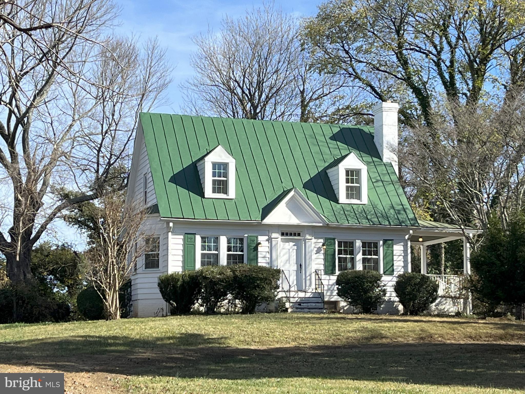 641 Old Meetze Road Warrenton, VA 20186 - Photo 1 of 15 a front view of a house with a yard