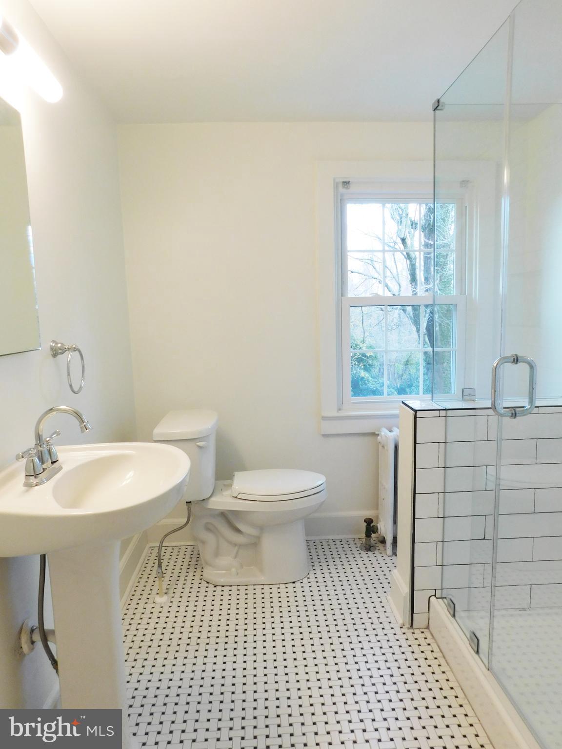 641 Old Meetze Road Warrenton, VA 20186 - Photo 12 of 15 a bathroom with a sink toilet and shower