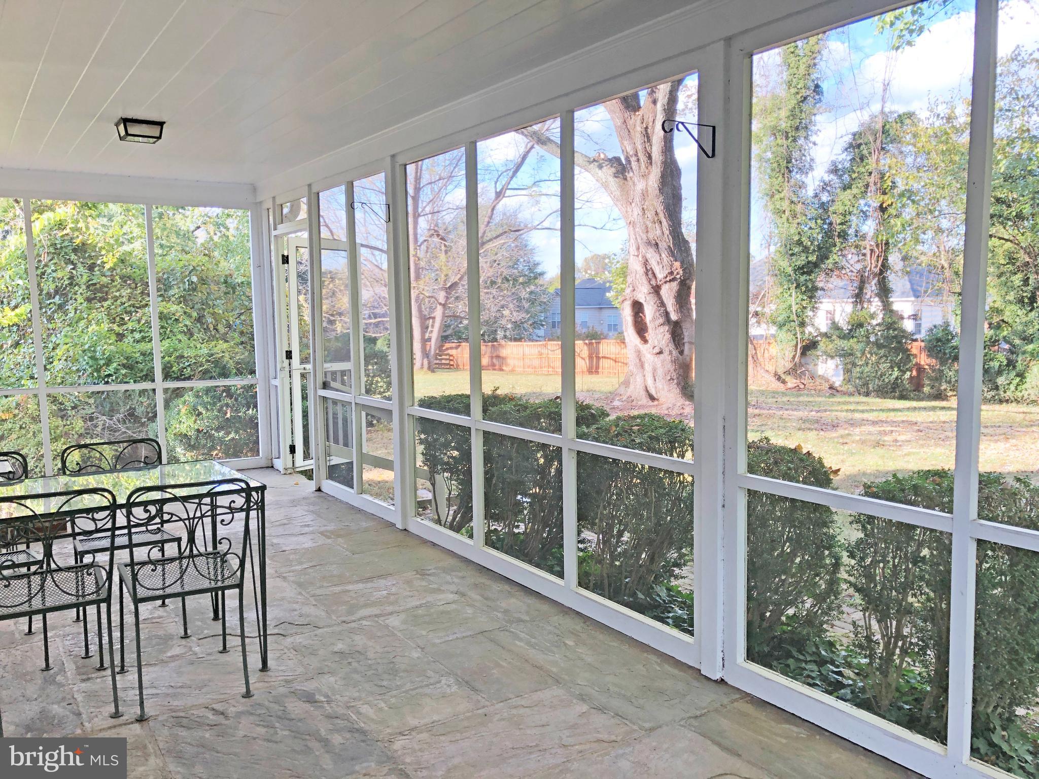 641 Old Meetze Road Warrenton, VA 20186 - Photo 14 of 15 a dining room with furniture and large windows