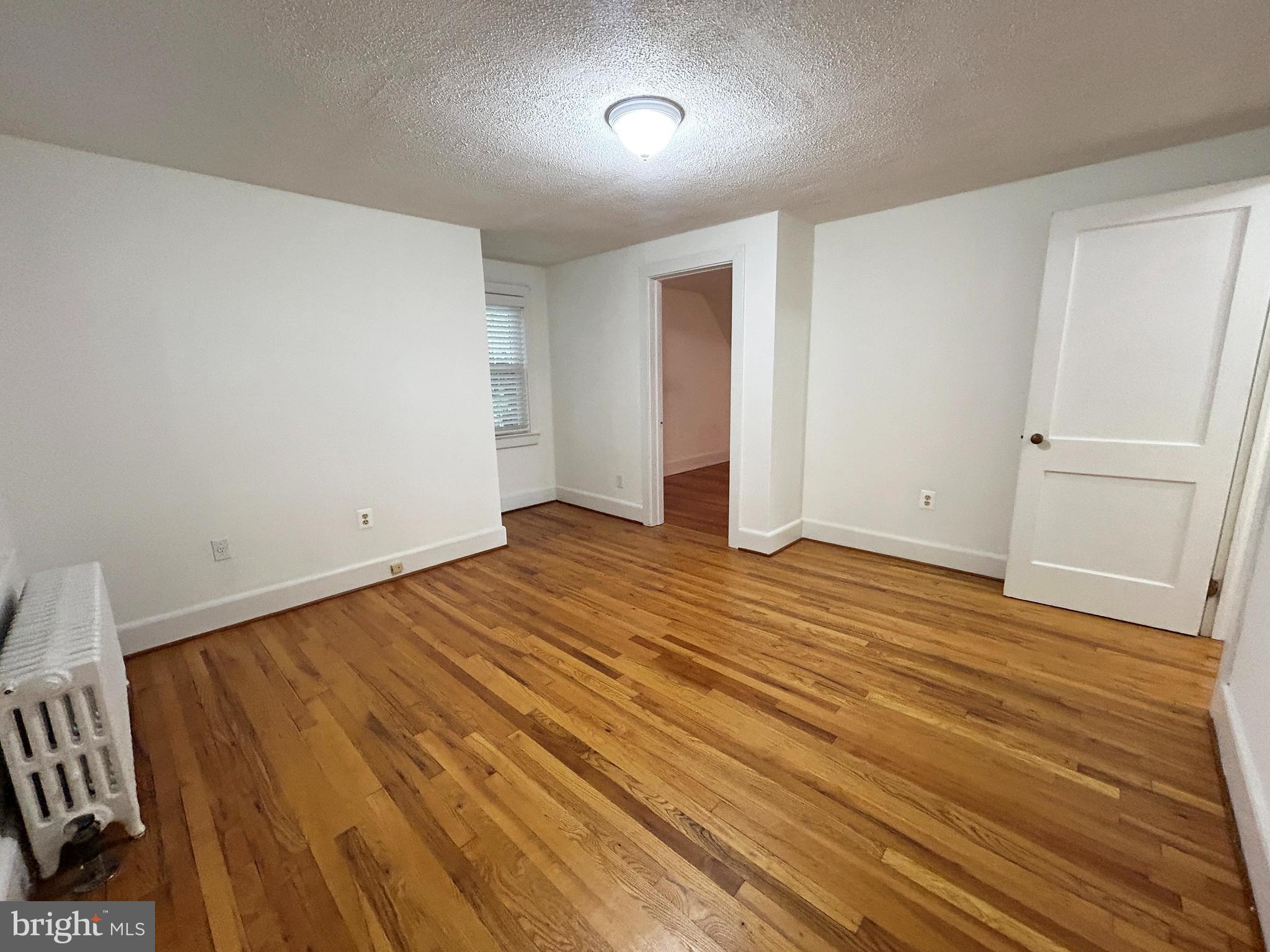 641 Old Meetze Road Warrenton, VA 20186 - Photo 9 of 15 wooden floor in an empty room