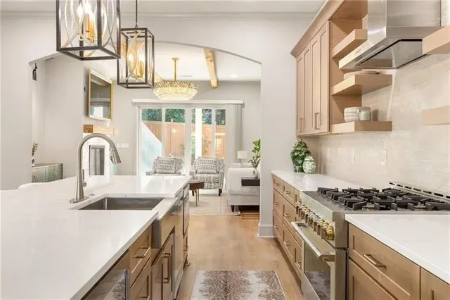 a kitchen with granite countertop cabinets and stainless steel appliances