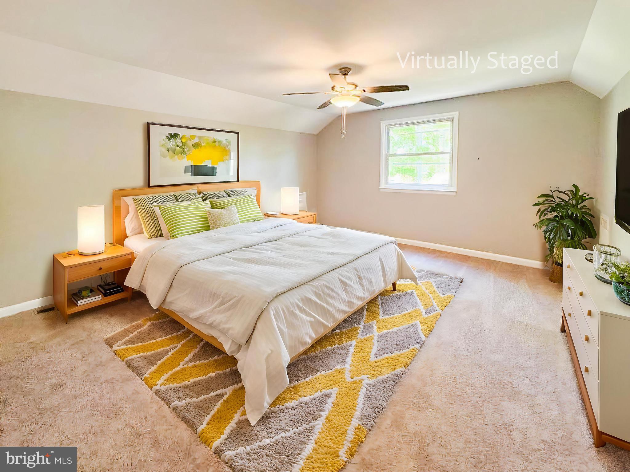 112 Hemlock Drive Williamstown, NJ 08094 - Photo 3 of 12 a bedroom with a bed and a chandelier