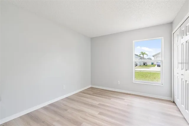 wooden floor and window in a room
