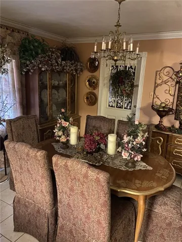 a room with table and chairs