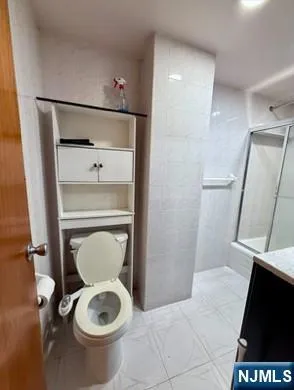 a bathroom with a toilet and a sink
