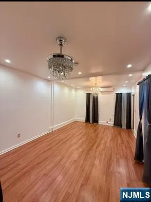 a view of a big room with wooden floor