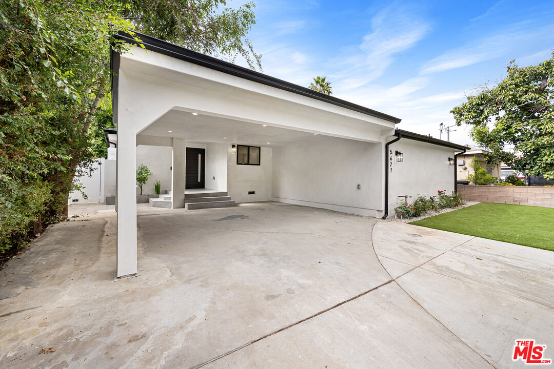 5627 Agnes Avenue Valley Village, CA 91607 - Photo 2 of 11 a view of a house with a backyard