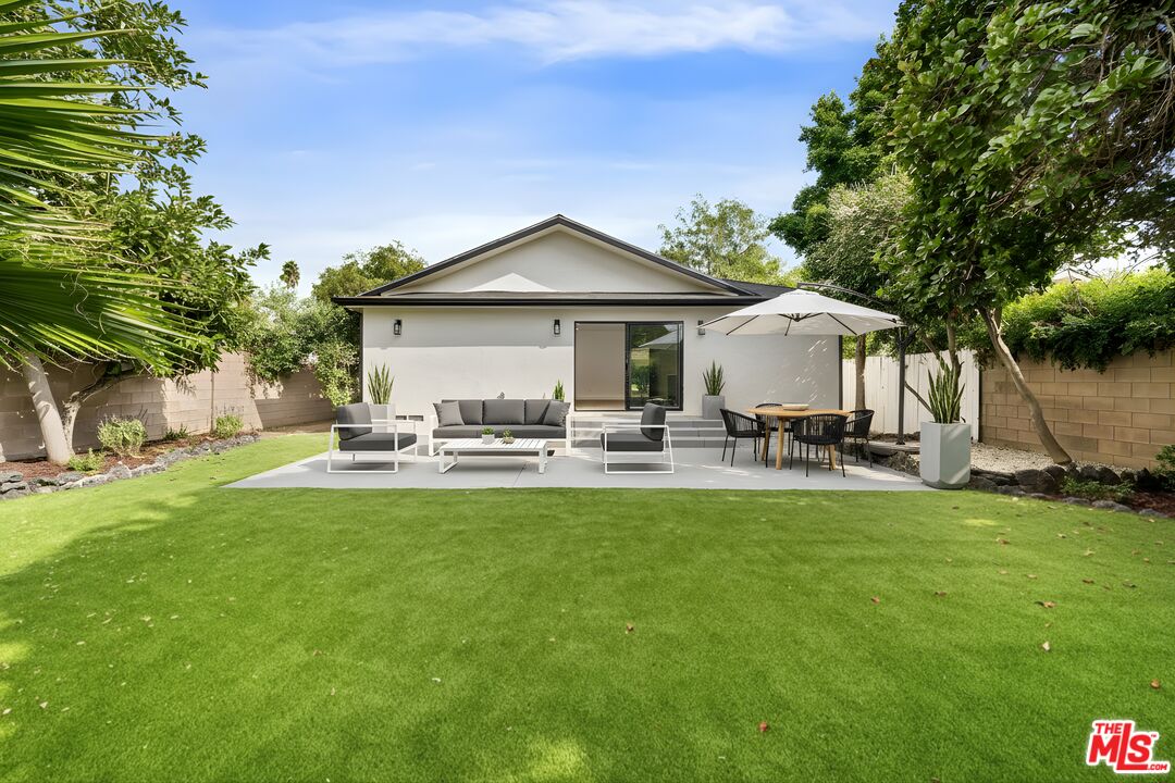 5627 Agnes Avenue Valley Village, CA 91607 - Photo 10 of 11 a view of a house with swimming pool and sitting area