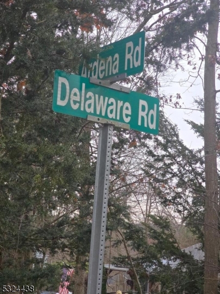 0 Jenkins Road Hewitt, NJ 07421 - Photo 5 of 5 a view of a street sign under a large tree