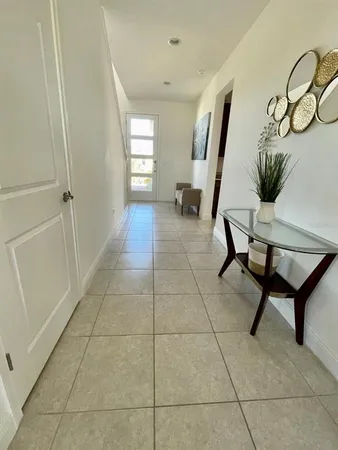 a view of a livingroom with furniture and window