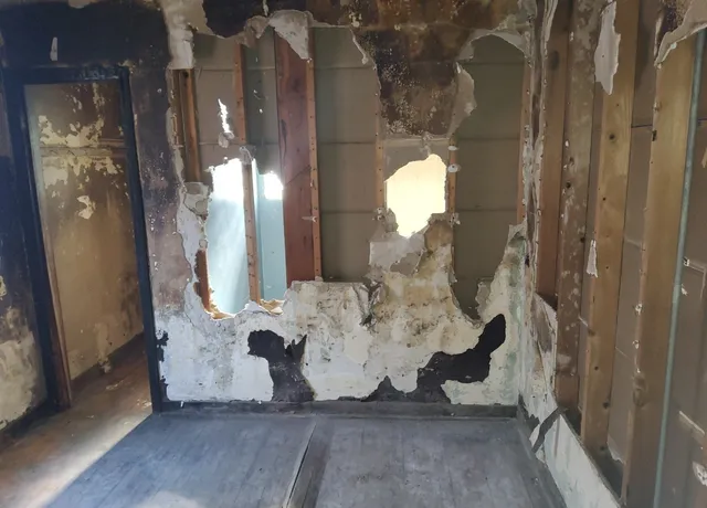 a view of a entryway door with wooden floor