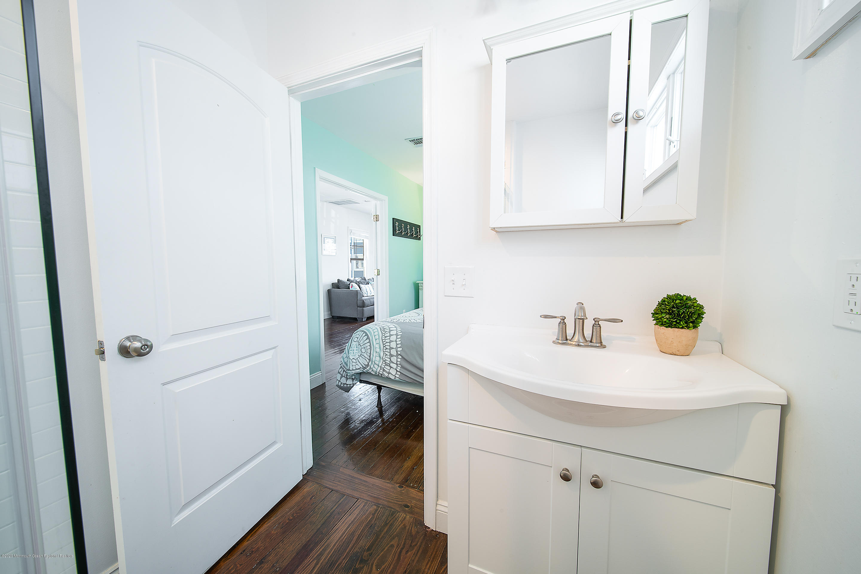 22 Cornwall Street Highlands, NJ 07732 - Photo 11 of 24 a bathroom with a sink and a mirror