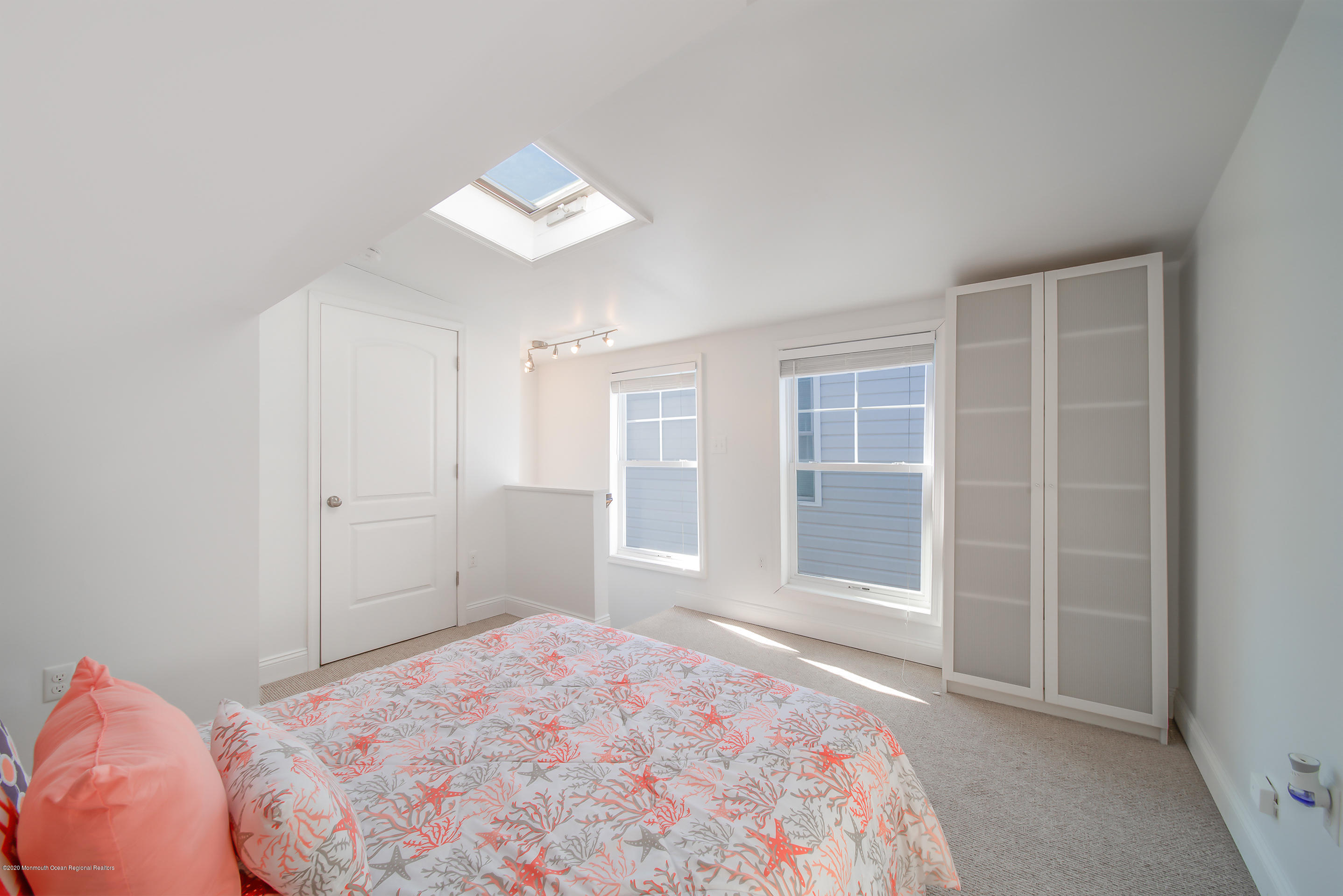 22 Cornwall Street Highlands, NJ 07732 - Photo 14 of 24 a bedroom with a bed and a window