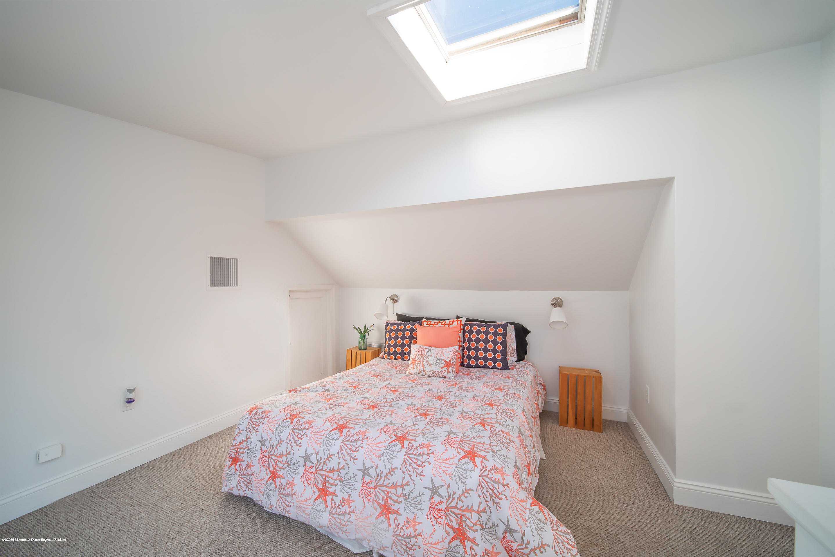 22 Cornwall Street Highlands, NJ 07732 - Photo 15 of 24 a bedroom with a bed and a window