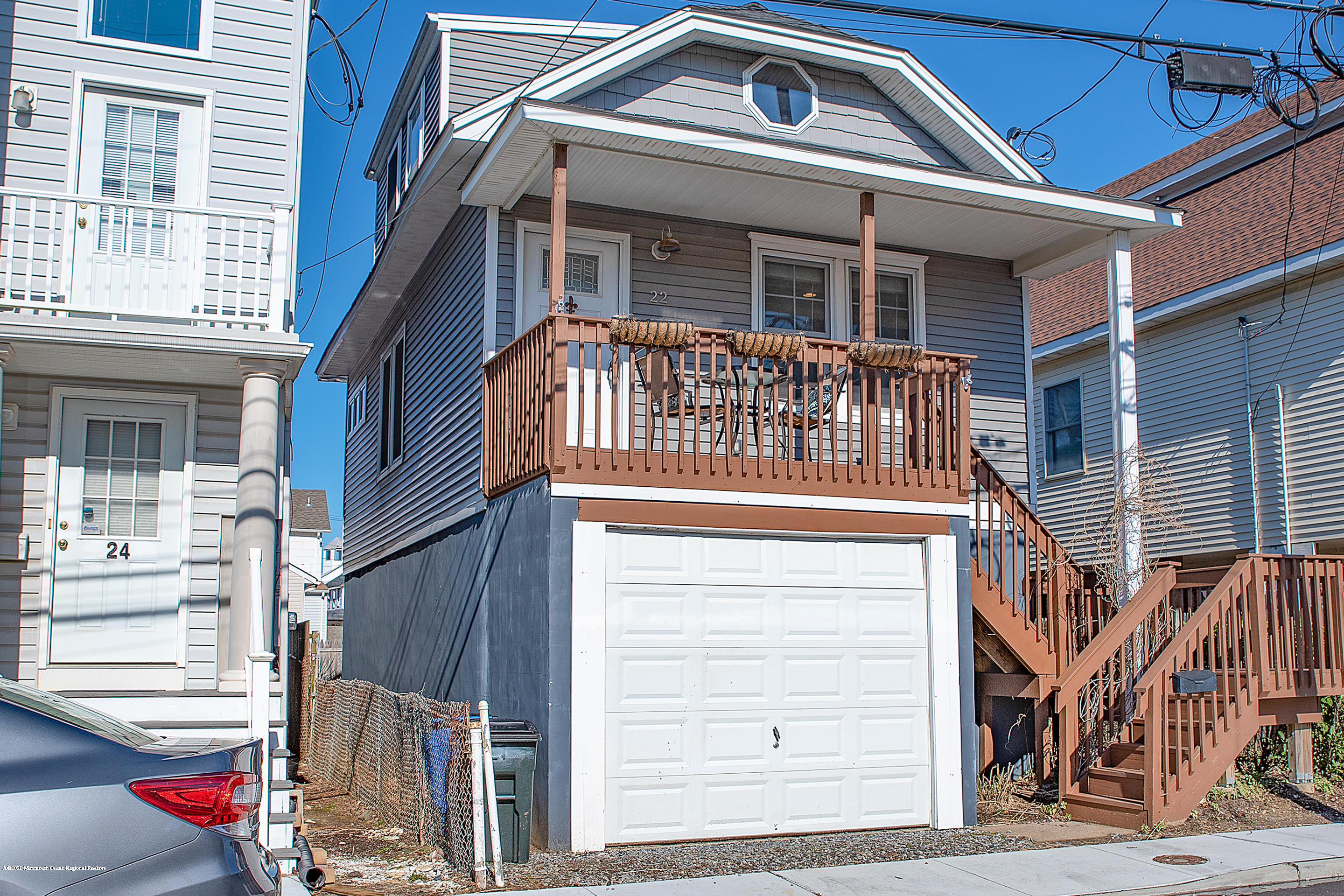 22 Cornwall Street Highlands, NJ 07732 - Photo 2 of 24 a front view of a house with a front door