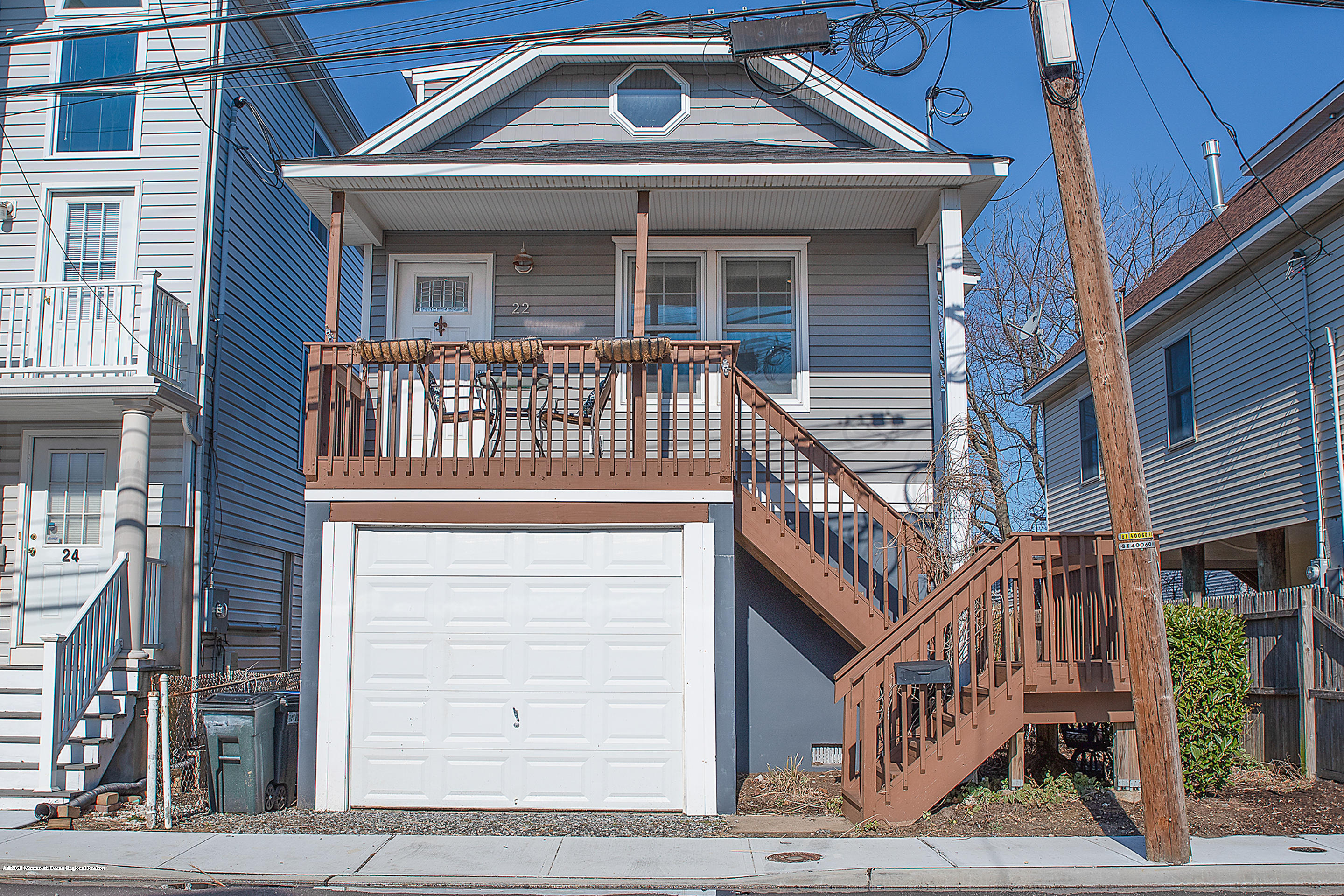 22 Cornwall Street Highlands, NJ 07732 - Photo 21 of 24 a front view of a house with a front door