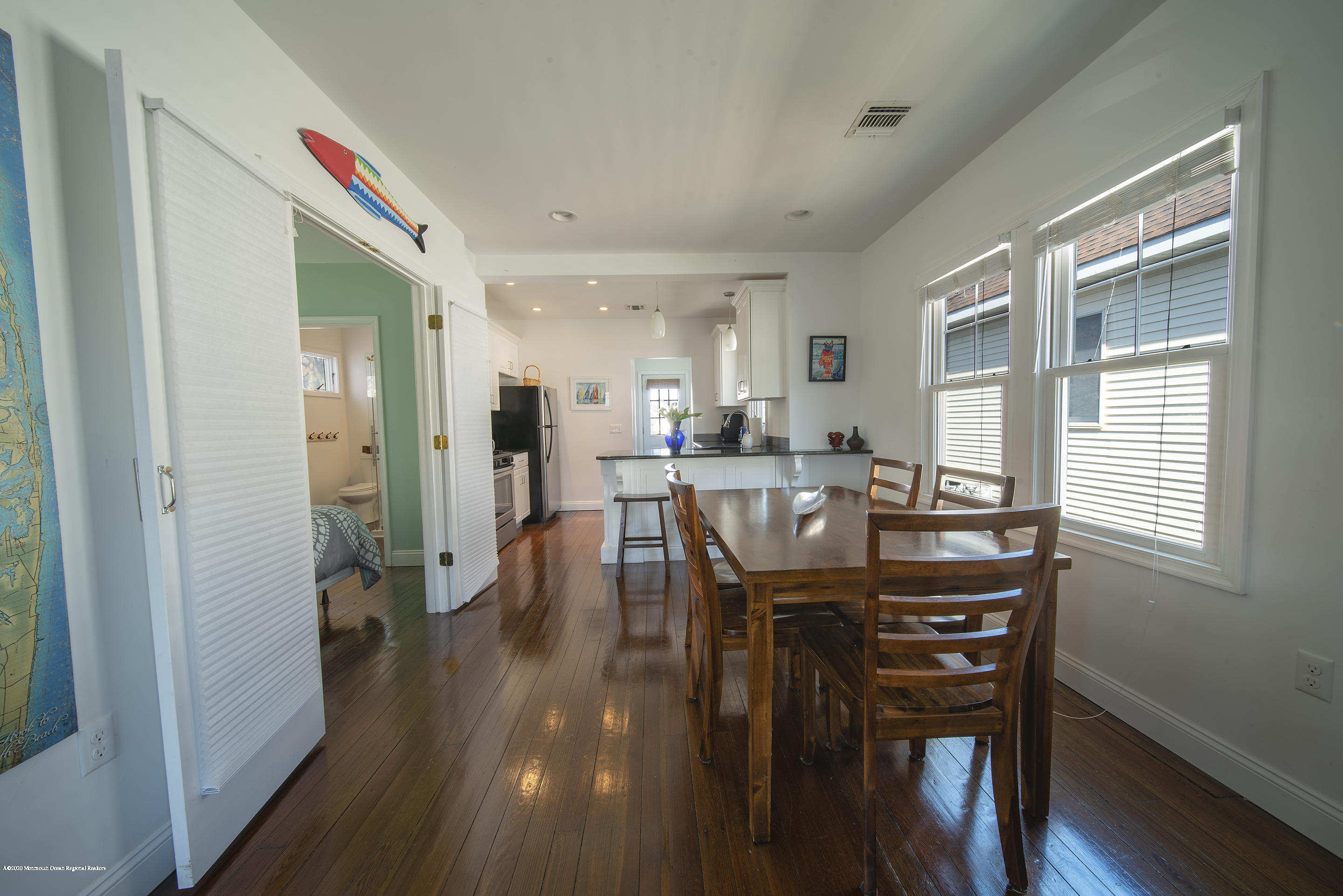 22 Cornwall Street Highlands, NJ 07732 - Photo 5 of 24 a dining room with furniture and wooden floor
