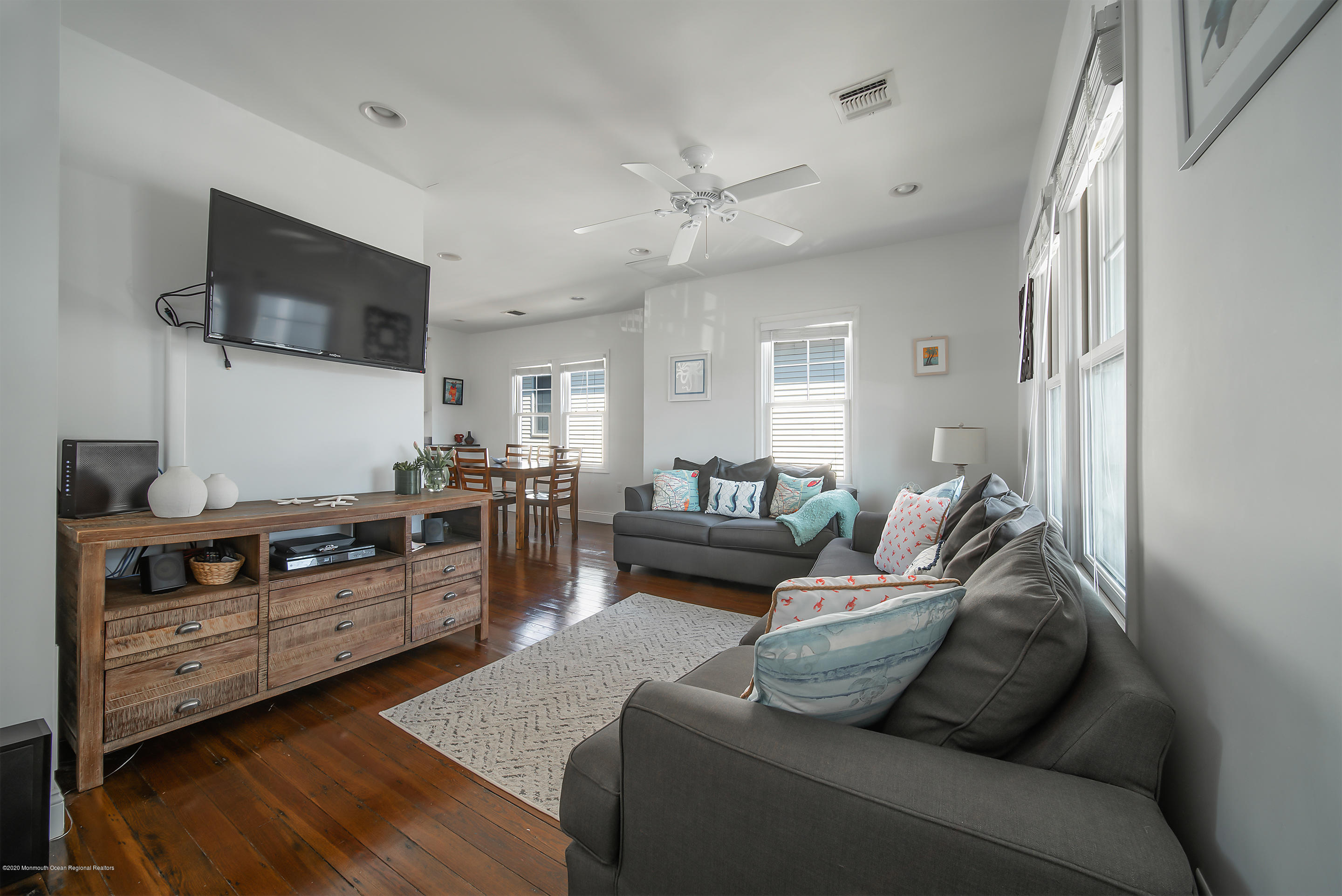 22 Cornwall Street Highlands, NJ 07732 - Photo 6 of 24 a living room with furniture and a flat screen tv