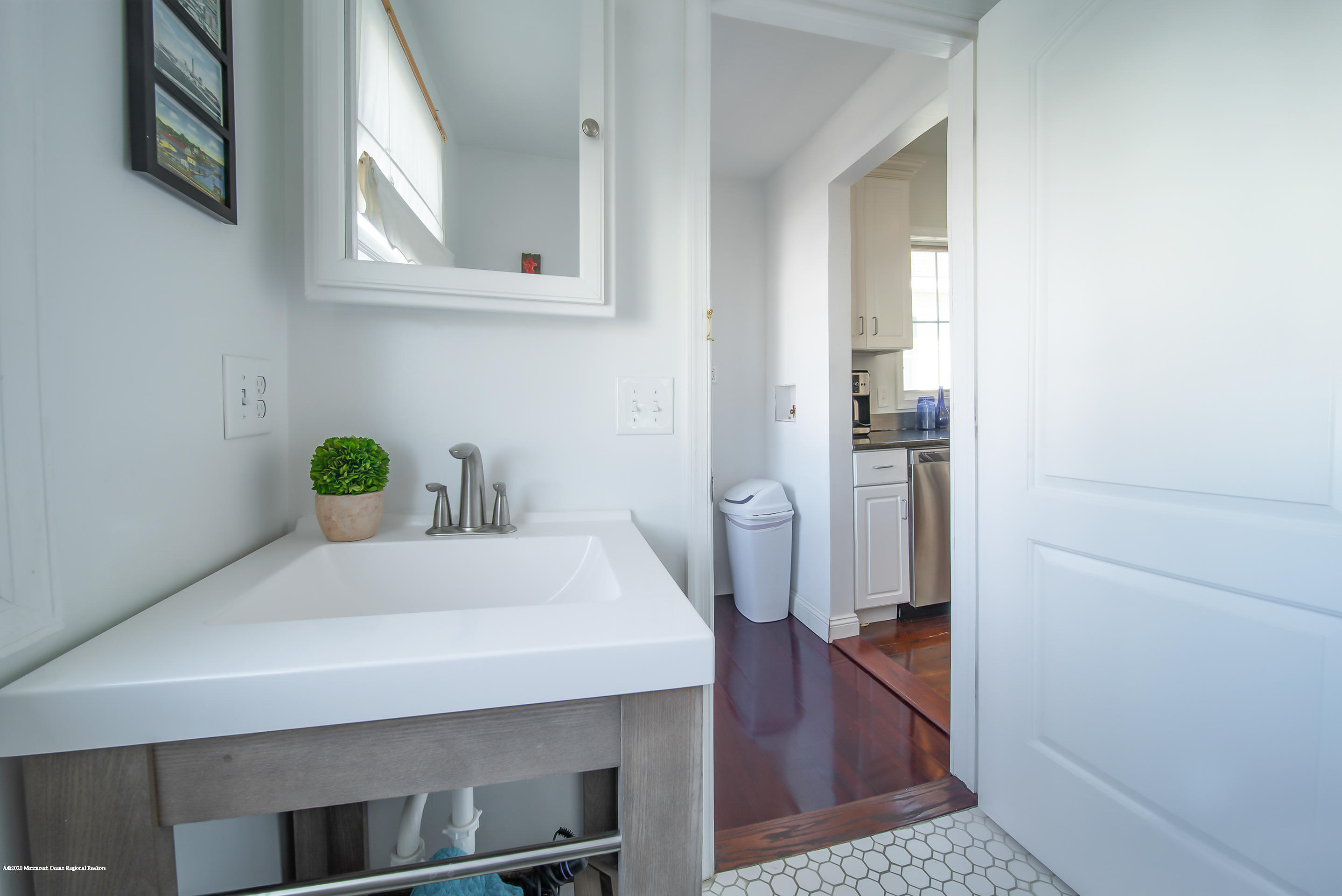 22 Cornwall Street Highlands, NJ 07732 - Photo 8 of 24 a bathroom with a sink a toilet and a shower