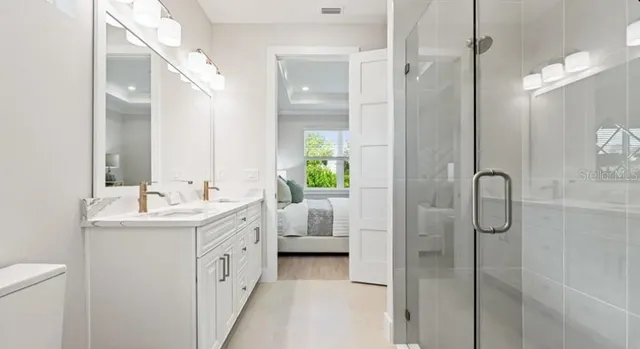 an aerial view of residential house with outdoor space and swimming pool