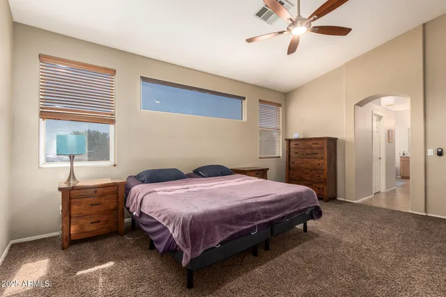 a view of a bathroom from a corridor