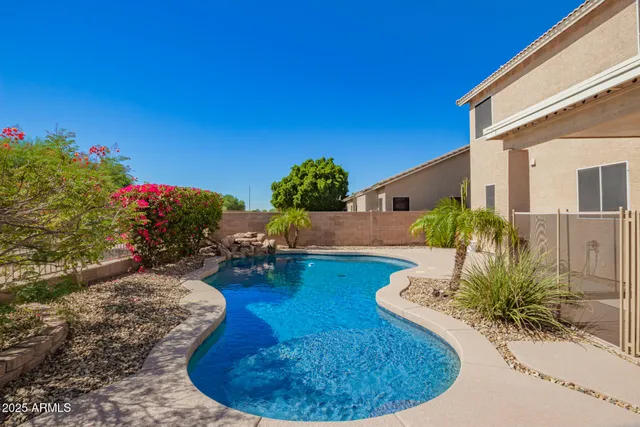 an aerial view of houses with outdoor space