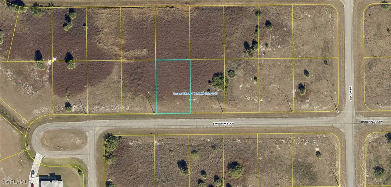 208 Lynbrook Loop LaBelle, FL 33935 - Photo 2 of 4 a bathroom with a granite countertop shower