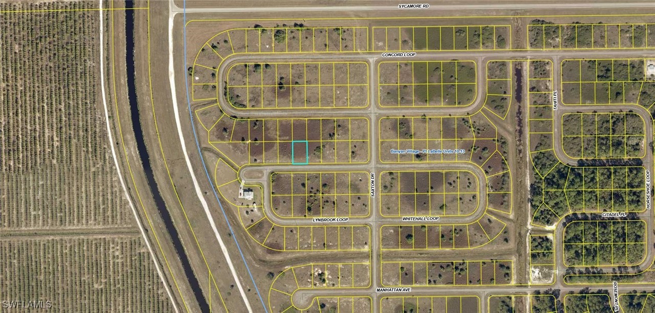 208 Lynbrook Loop LaBelle, FL 33935 - Photo 4 of 4 a front view of a building