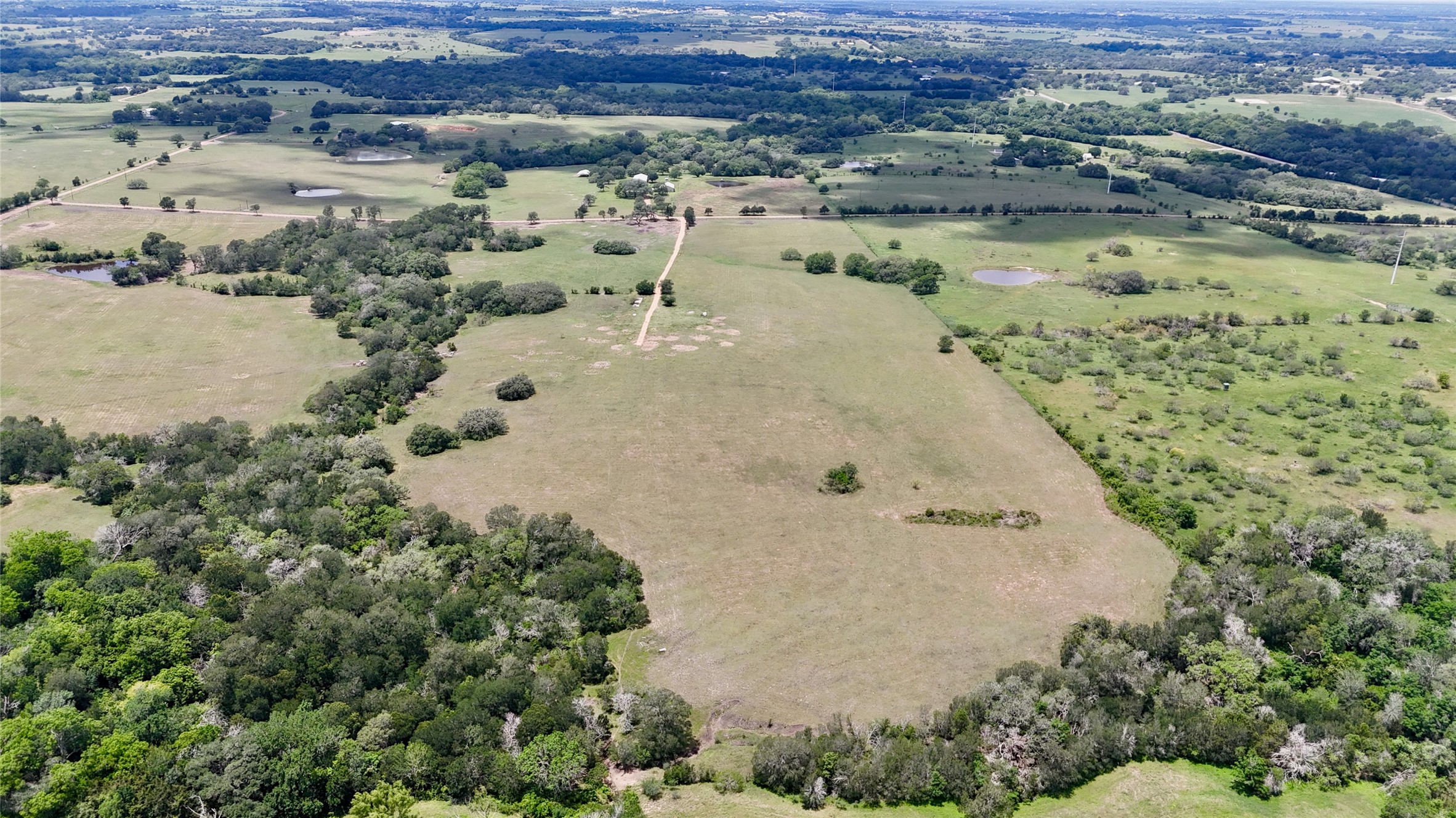 2116 Langdon Road Weimar, TX 78962 - Photo 5 of 43 an aerial view of residential houses with outdoor space