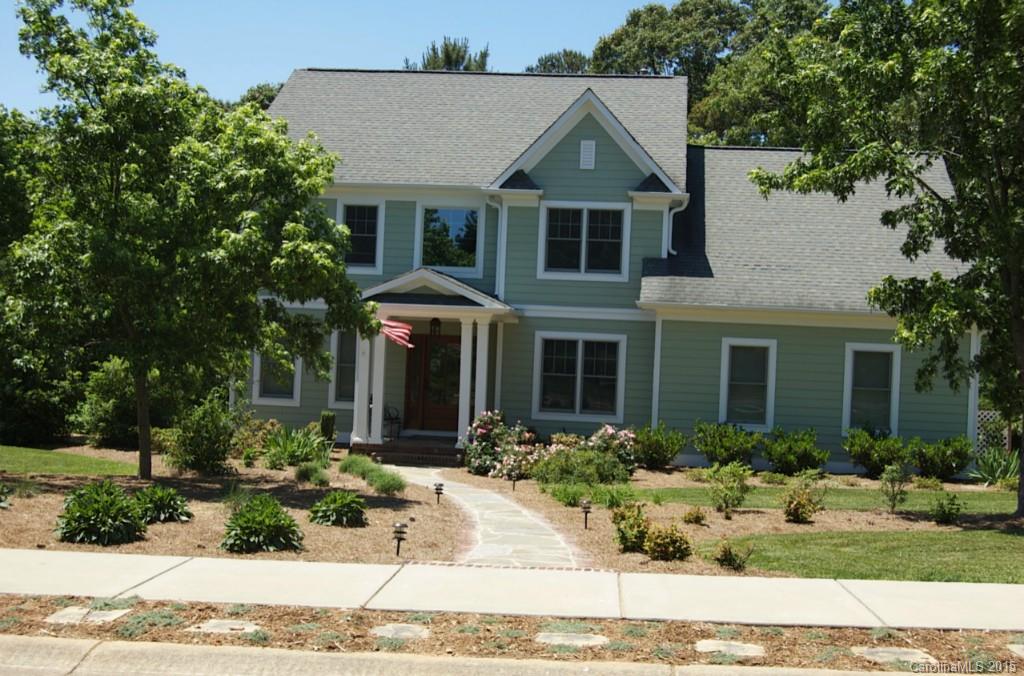 190 Kimberly Road Davidson, NC 28036 - Photo 1 of 21 a front view of a house with a yard