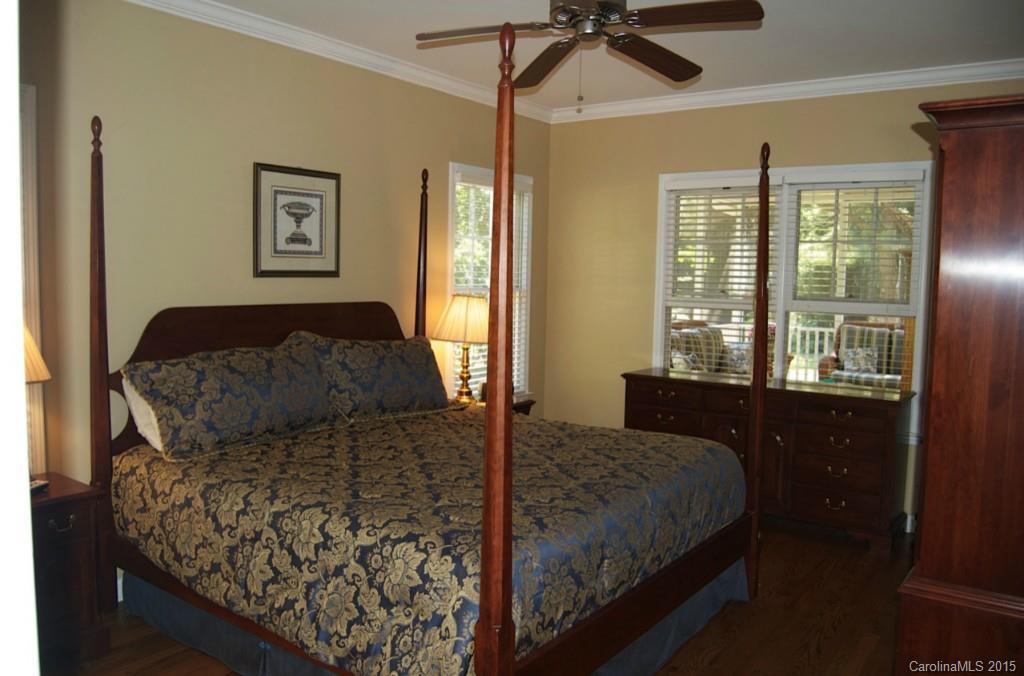 190 Kimberly Road Davidson, NC 28036 - Photo 12 of 21 a bedroom with a bed and a window