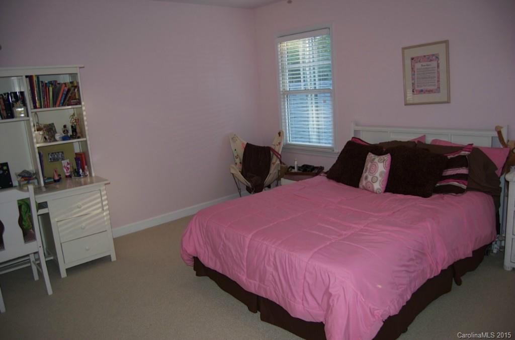 190 Kimberly Road Davidson, NC 28036 - Photo 18 of 21 a bedroom with a bed and window