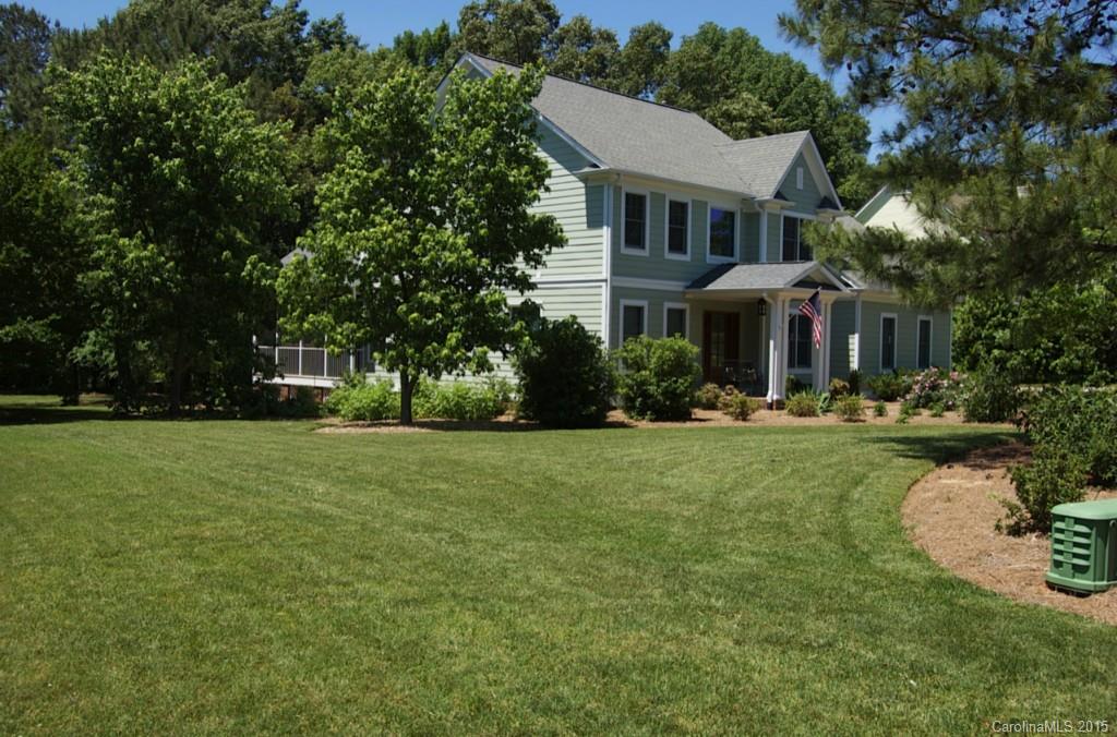 190 Kimberly Road Davidson, NC 28036 - Photo 3 of 21 a front view of a house with garden