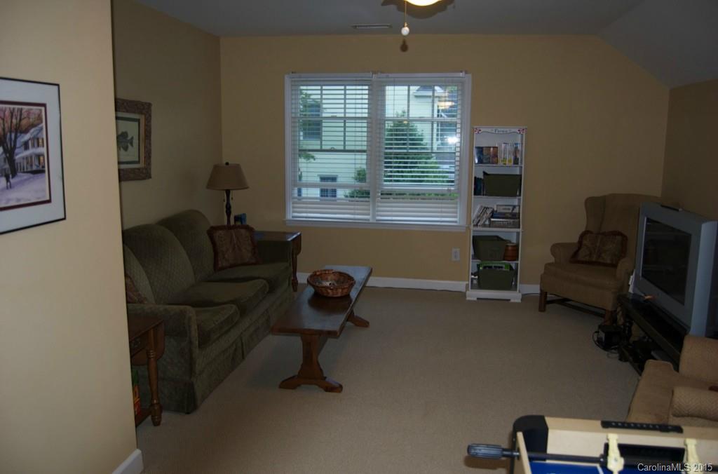 190 Kimberly Road Davidson, NC 28036 - Photo 21 of 21 a living room with furniture and a window