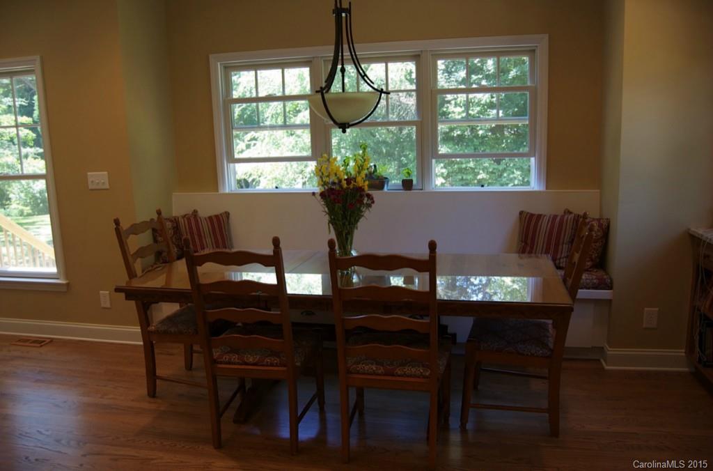 190 Kimberly Road Davidson, NC 28036 - Photo 8 of 21 a view of a dining room with furniture window and wooden floor