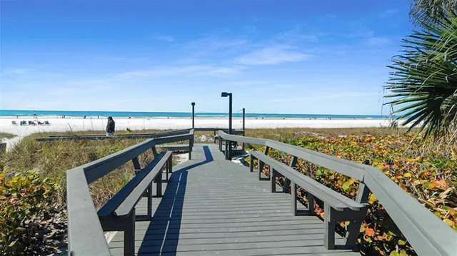 a view of a balcony with furniture