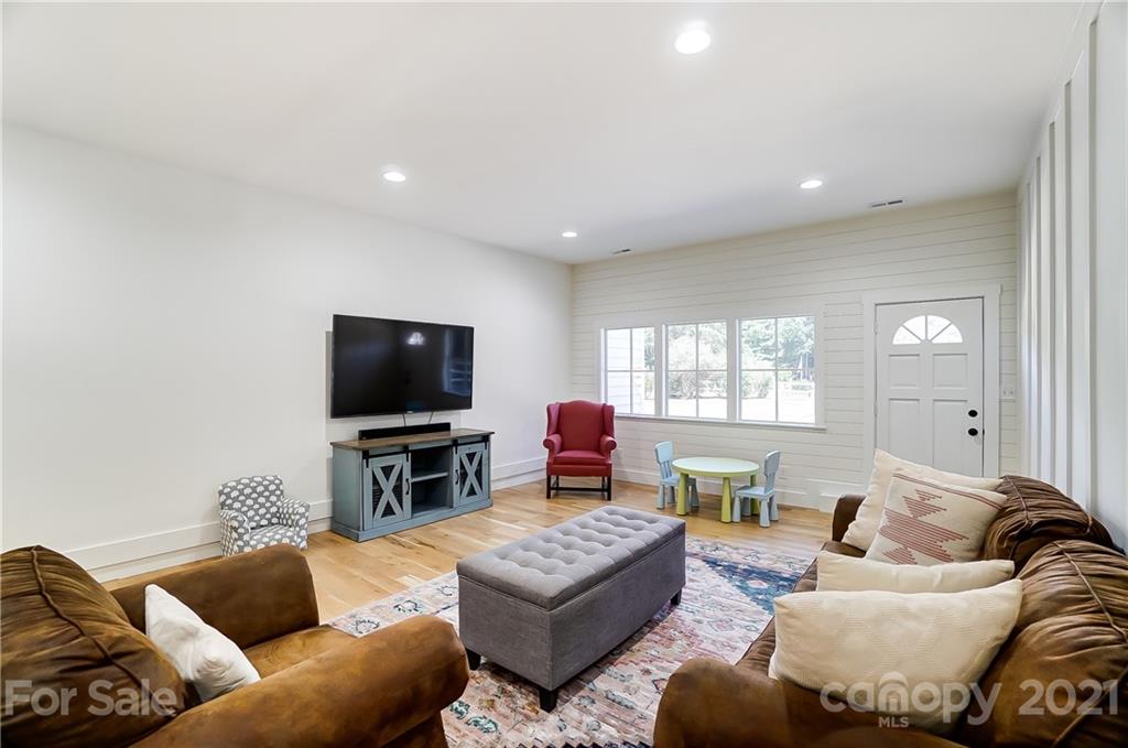 2375 Whitley Road Fort Mill, SC 29708 - Photo 15 of 35 a living room with furniture and a flat screen tv