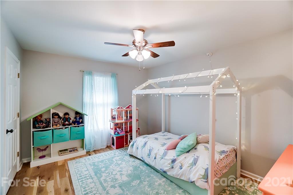 2375 Whitley Road Fort Mill, SC 29708 - Photo 23 of 35 a bedroom with a bed closet and a window