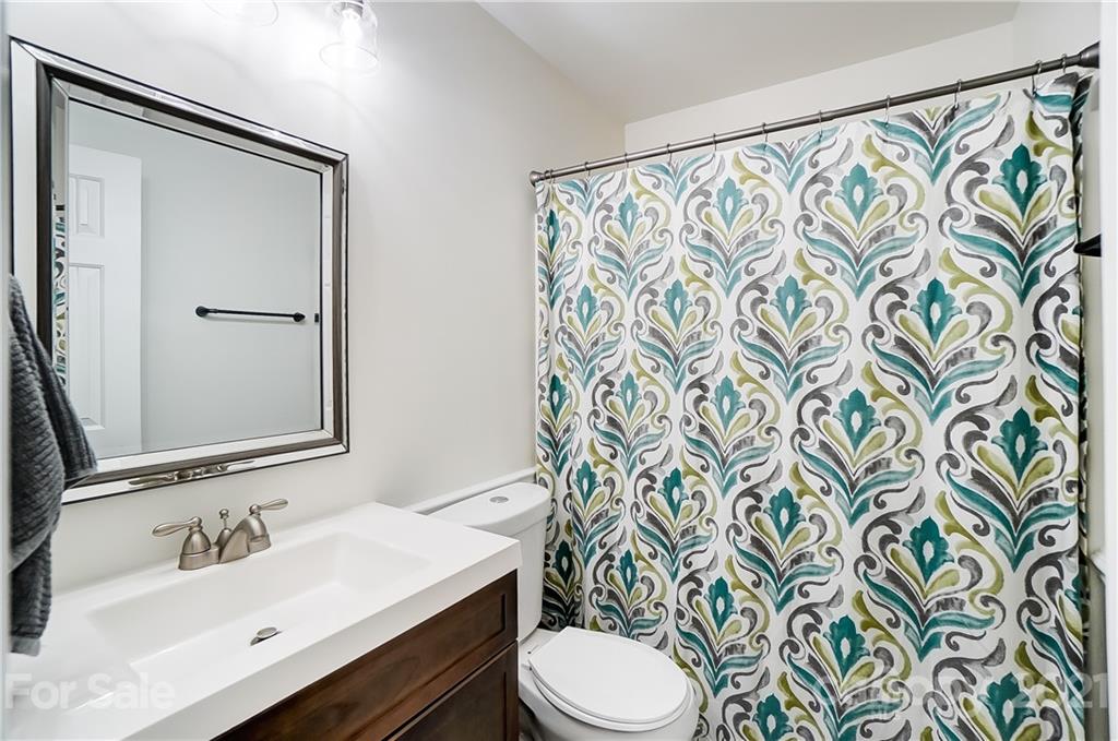 2375 Whitley Road Fort Mill, SC 29708 - Photo 25 of 35 a bathroom with a sink toilet and mirror
