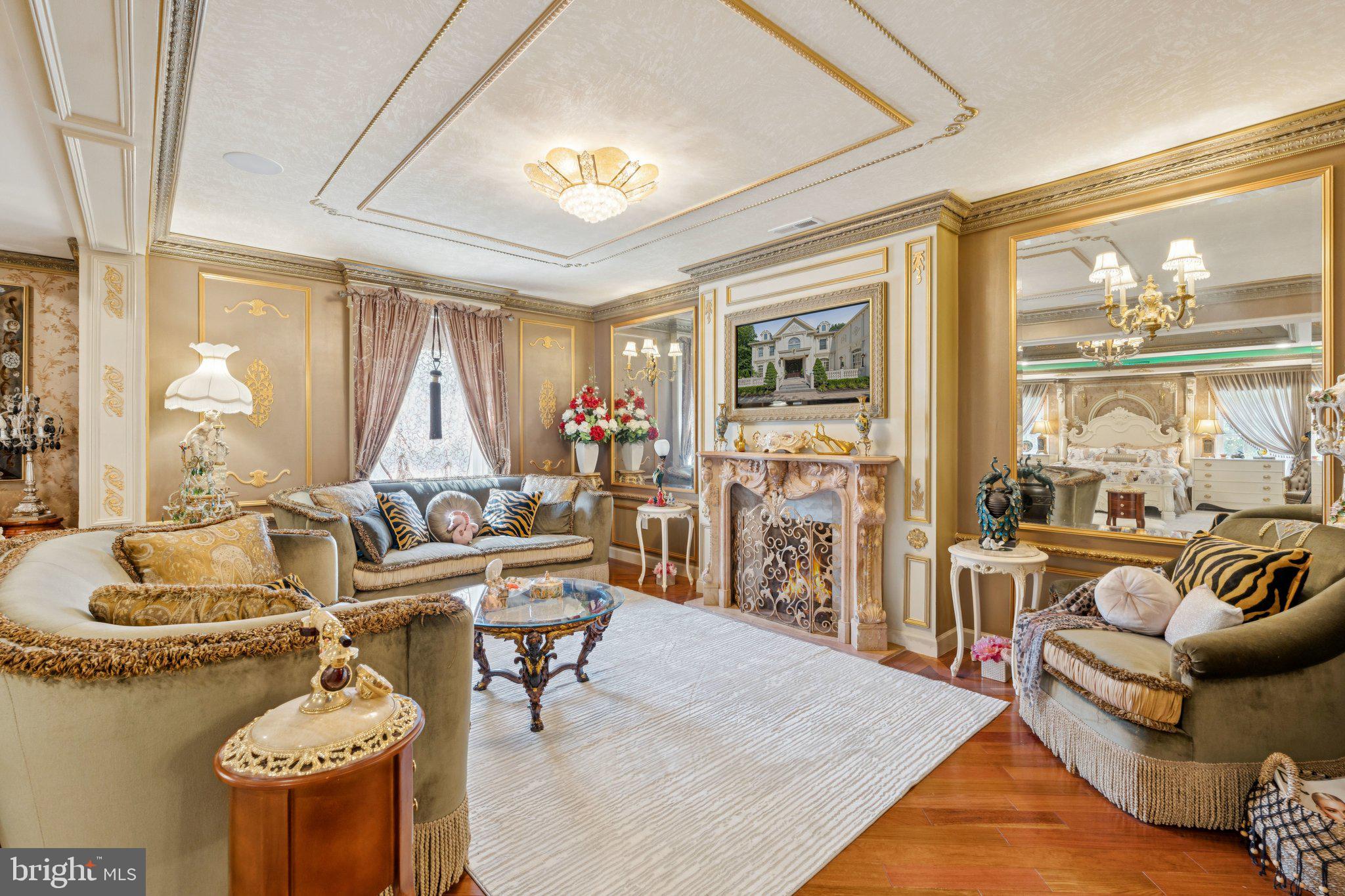 423 Seneca Road Great Falls, VA 22066 - Photo 25 of 52 a living room with furniture and a floor to ceiling window