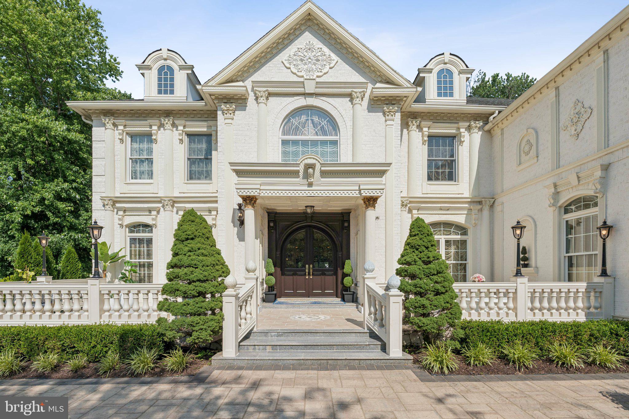 423 Seneca Road Great Falls, VA 22066 - Photo 3 of 52 a view of a house with a garden