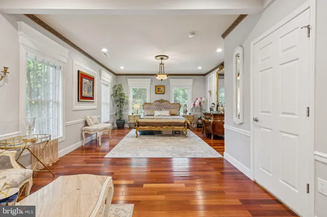 a living room with furniture and a projector
