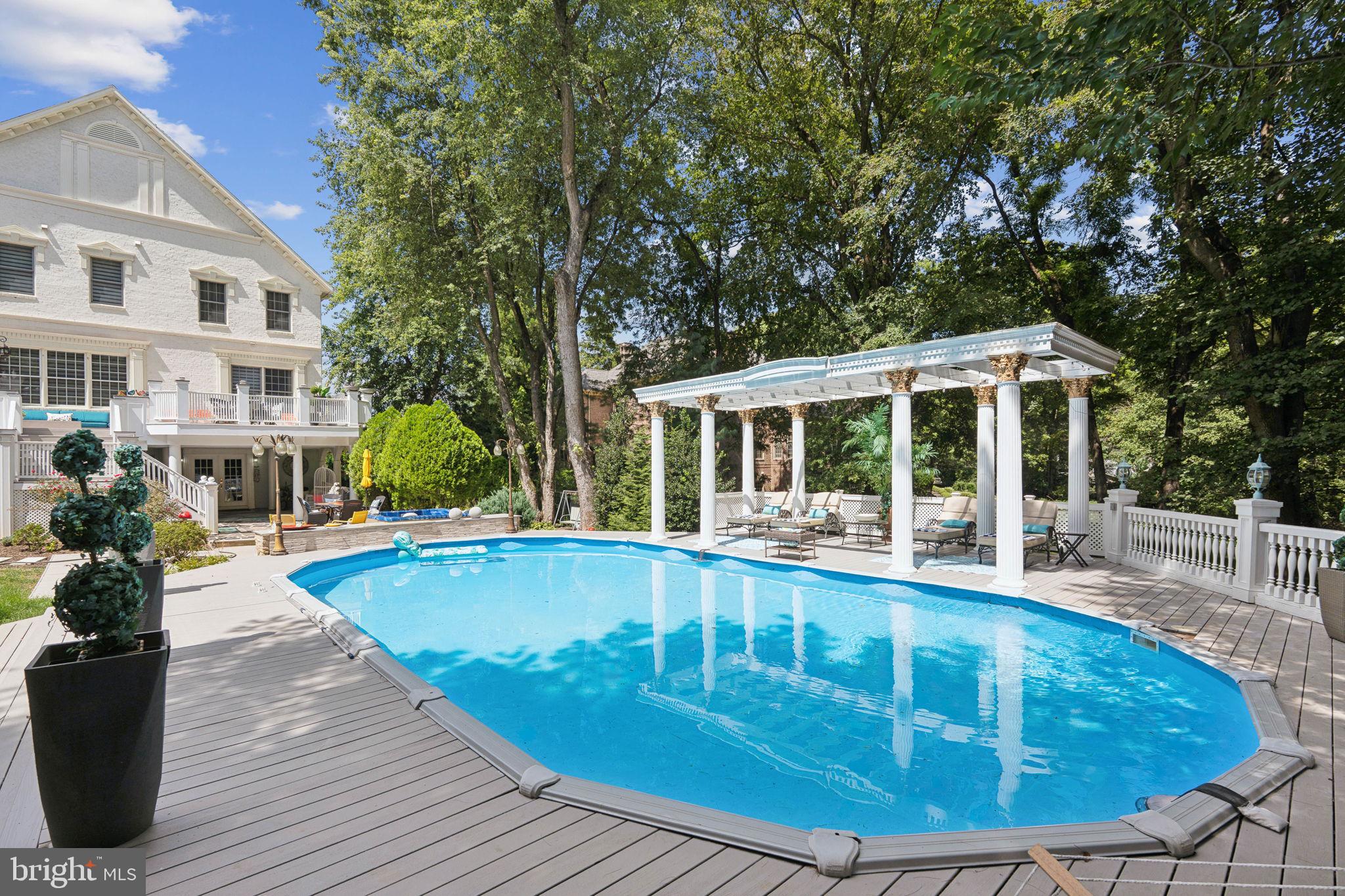 423 Seneca Road Great Falls, VA 22066 - Photo 37 of 52 a view of a house with sitting area