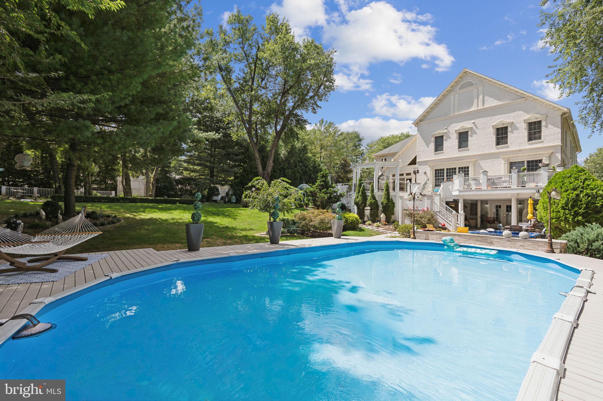 423 Seneca Road Great Falls, VA 22066 - Photo 39 of 52 a view of a house with swimming pool