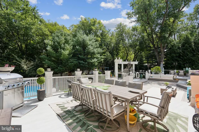 a view of a chairs and table in a yard