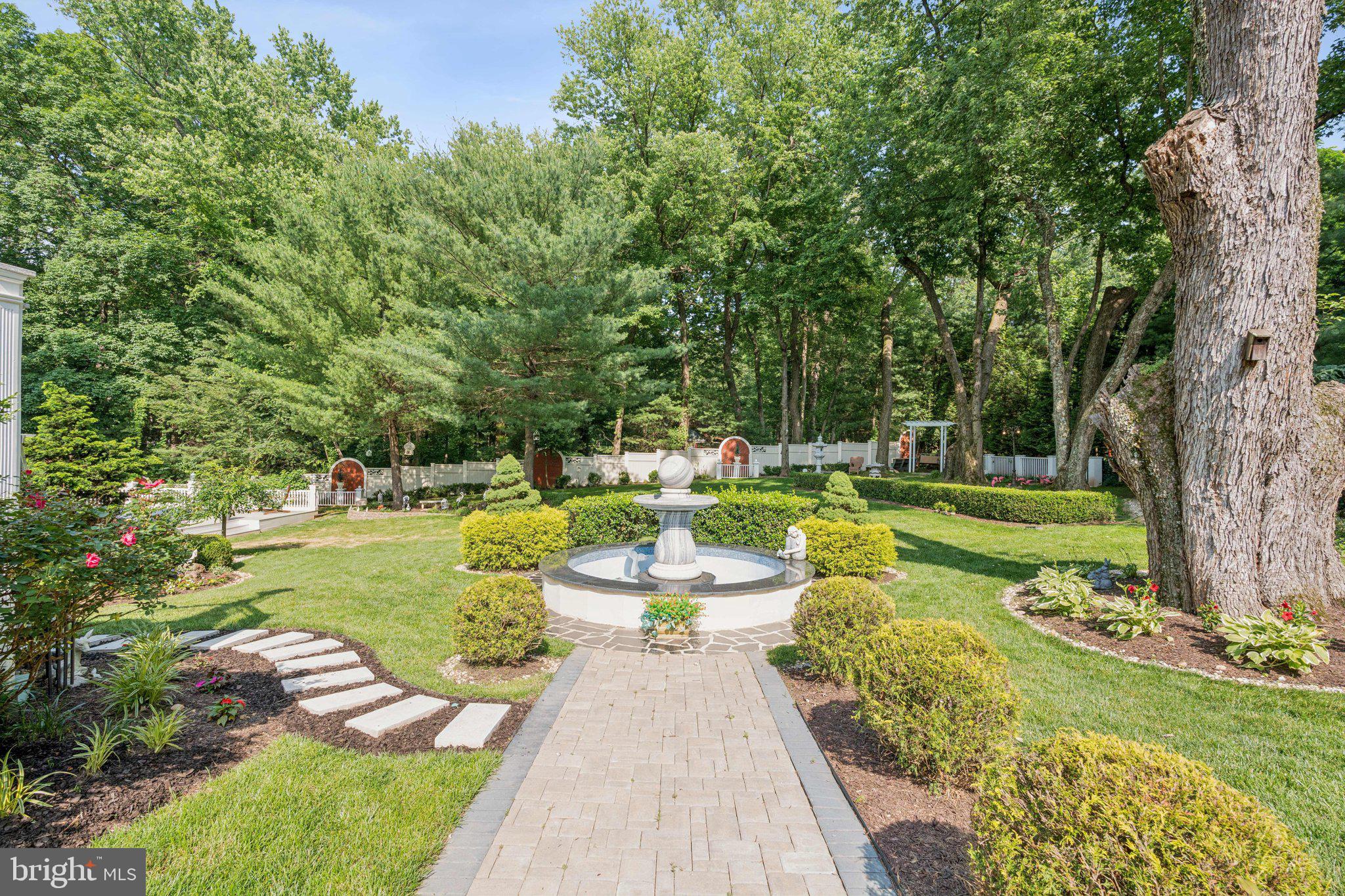 423 Seneca Road Great Falls, VA 22066 - Photo 47 of 52 a view of a swimming pool with a patio