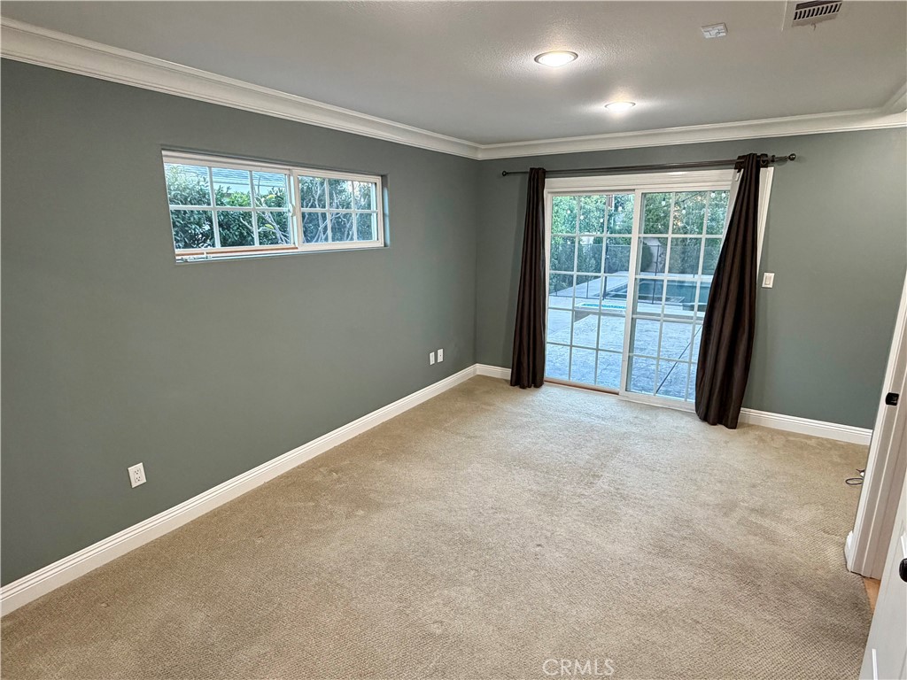 5243 East Arbor Road Long Beach, CA 90808 - Photo 19 of 46 a view of an empty room with a window
