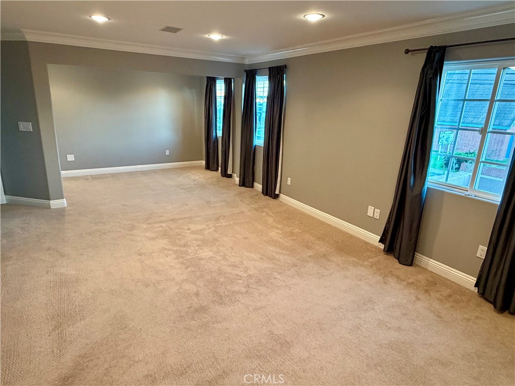 5243 East Arbor Road Long Beach, CA 90808 - Photo 23 of 46 a view of an empty room with a window